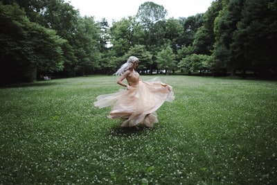 Standing on the grass dance woman
